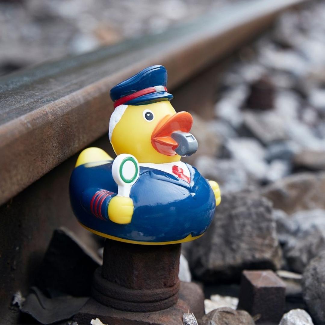 M131287 Multicoloured - Squeaky duck train attendant - mbw
