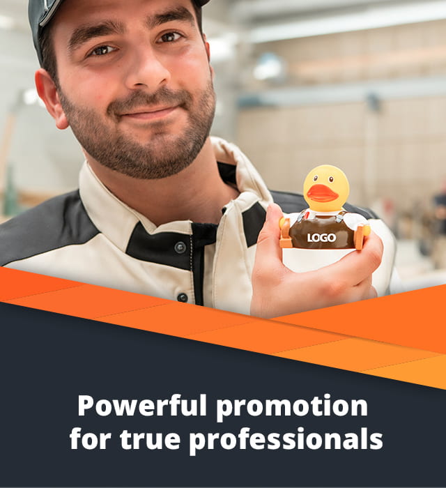 A craftsman holds up a carpenter's duck featuring the logo for the camera